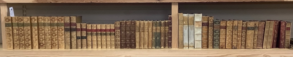 A collection of mixed 19th and 20th century leather bound books